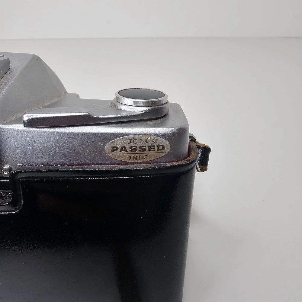 Vintage Topcon Uni 35mm SLR Camera with UV Topcor 53mm f2 Lens and Case Untested